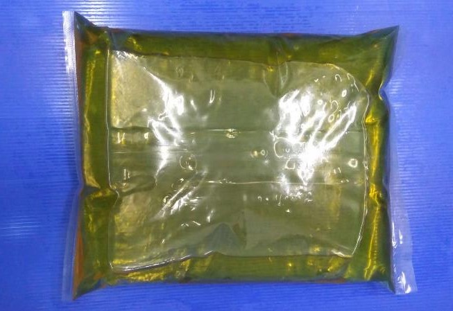 3kg Oil Laminated Center Flat Seal Bag with Punch Two Holes Handle 2.jpg